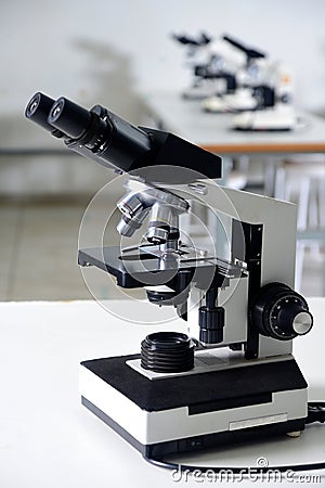 microscope optical instrument capable of magnifying images of very small objects thanks to its resolving power Stock Photo