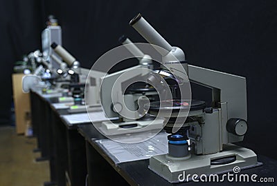 Microscopes set on the worktable of the school lab Stock Photo