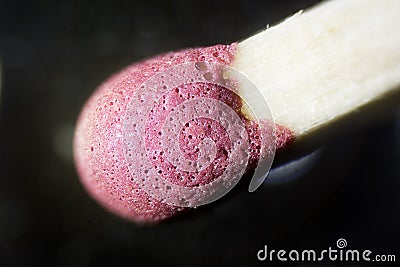 The Microscopic World. Match head under the microscope Stock Photo