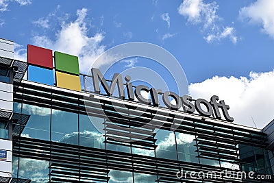 Microsoft emblem and logo on the facade of Microsoft Polska building Editorial Stock Photo