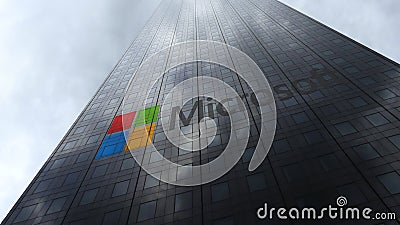 Microsoft logo on a skyscraper facade reflecting clouds. Editorial 3D rendering Editorial Stock Photo