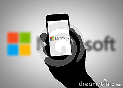 MICROSOFT mobile device with Microsoft app Editorial Stock Photo