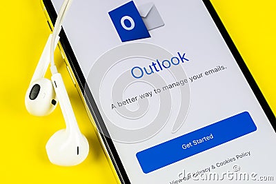 Microsoft Outlook office application icon on Apple iPhone X screen close-up. Microsoft outlook app icon. Microsoft OutLook applica Editorial Stock Photo