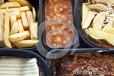 Microwavable ready to cook, frozen foods, in plastic boxes . Stock Photo