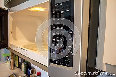 Microwave buttons - open Editorial Stock Photo