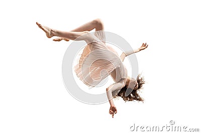 Mid-air beauty. Full length studio shot of attractive young woman hovering in air and keeping eyes closed Stock Photo