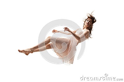 Mid-air beauty. Full length studio shot of attractive young woman hovering in air and keeping eyes closed Stock Photo