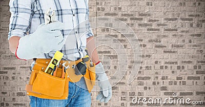 Mid section of handyman holding pliers Stock Photo