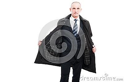 Middle age business man posing wearing raincoat Stock Photo