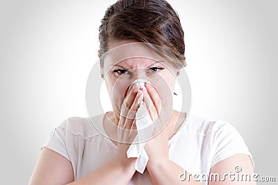 Middle Age Lady Blowing Her Nose too hard Stock Photo