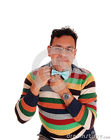 Middle age man fixing his bowtie. Stock Photo