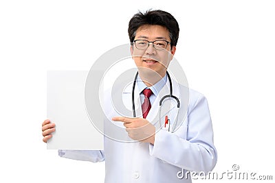 Middle-aged Asian doctor holding message board on white background Stock Photo