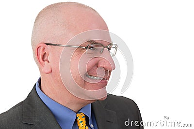 Middle-aged businessman giving a wry smile Stock Photo