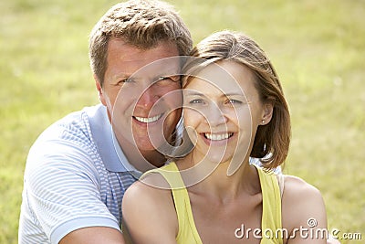 Middle aged couple having fun in countryside Stock Photo