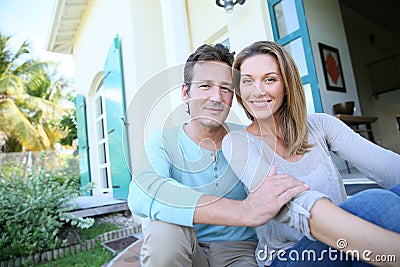 Middle-aged couple sitting in the garden Stock Photo