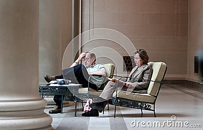 Middle aged couple taking rest in National Gallery of Art in Washington DC Editorial Stock Photo