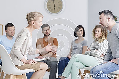 Couple talking during assertiveness training Stock Photo