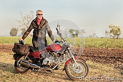 Middle aged european Indian motor cycle Stock Photo