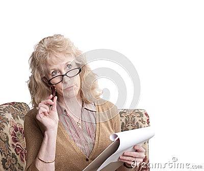 Middle-aged woman looking perplexed Stock Photo