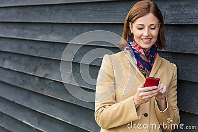 Middle Aged Woman Using Mobile Cell Phone Stock Photo