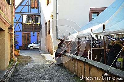 Middle Ages festival in medieval village Riquewihr Alsace France. Editorial Stock Photo