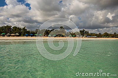 In the middle of an amazing, green and turquoise caribbean sea; transparent water, tropical paradise. Playa Macaro, Punta Cana, Stock Photo