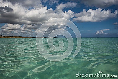 In the middle of an amazing, green and turquoise caribbean sea; transparent water, tropical paradise. Playa Macaro, Punta Cana, Stock Photo