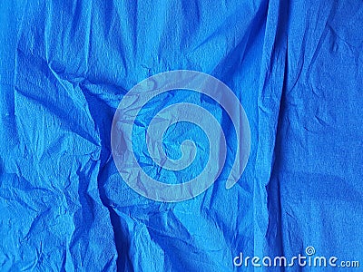 Middle blue wrinkled paper background satin blank texture, creased surface. for web and print Stock Photo