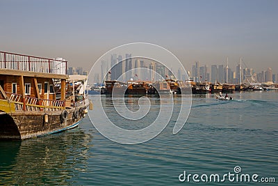 Middle East, Qatar, Doha, Harbour Boats & West Bay Central Financial District from East Bay District Editorial Stock Photo