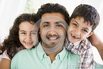 A Middle Eastern man with his children Stock Photo