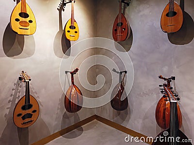 Middle Eastern Oud displayed on a wall | Musical instrument and traditional tool featured in Turkish and Arabic music Editorial Stock Photo