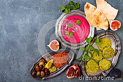 Middle Eastern traditional dinner. Authentic arab cuisine. Meze party food. Top view, flat lay Stock Photo