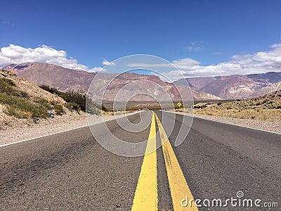 In the middle of an empty road Stock Photo