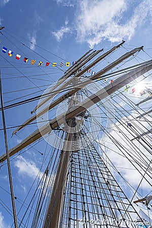 The middle mast with the six sails of tall ship Cisne Branco in the harbour of Scheveningen during the Sail on Scheveningen, Nethe Stock Photo