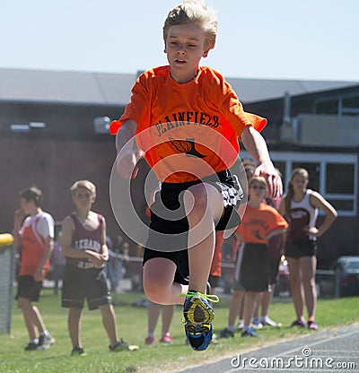 Middle school track long jump Editorial Stock Photo