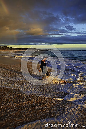 Middleage woman at makena beach Stock Photo