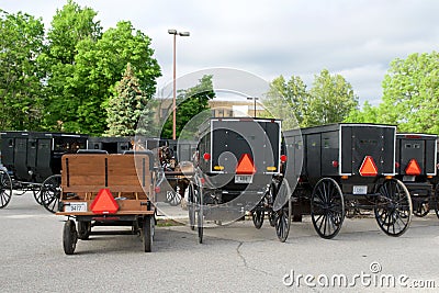 MIDDLEBURY, INDIANA, UNITED STATES - MAY 22nd, 2018: View of amish carriage along the city, known for simple living with Editorial Stock Photo