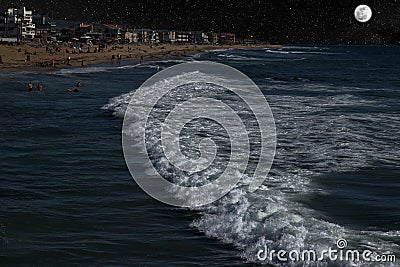 Midnight Ocean Swim In The Moonlight Stock Photo