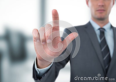 Midsection of businessman gesturing in office Stock Photo
