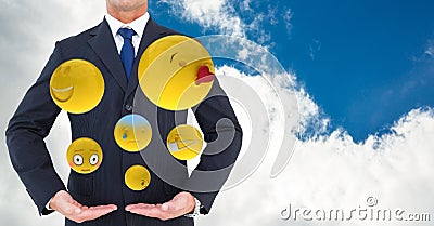 Midsection of businessman with various emojis Stock Photo