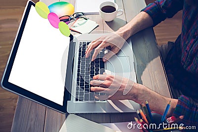 Midsection of creative graphic designer on laptop Stock Photo