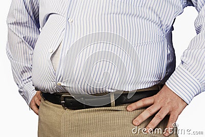 Midsection Of An Obese Man Wearing Tight Formal Shirt Stock Photo