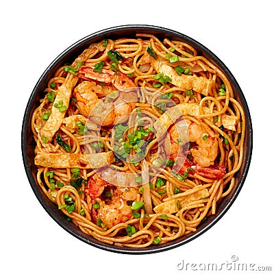 Mie Goreng in black bowl isolated on white. Indonesian cuisine prawn noodles and vegetables stir fired dish. Asian food Stock Photo