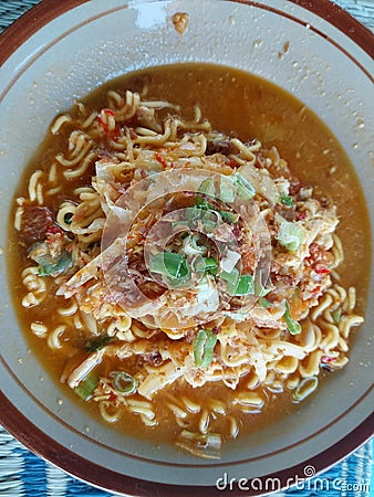 MIE TEK TEK is one of the street food found in every region. Mie tek tek is made from egg ,noddles or yellow noodles then mixed Stock Photo