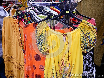 Colorful ladies clothes close up shot at local fair. Editorial Stock Photo