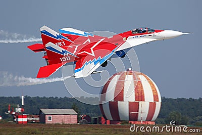 MiG-29OVT perfoming demonstration flight in Zhukovsky during MAKS-2011 airshow. Editorial Stock Photo