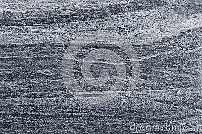 Migmatitic gneiss migmatite rock bands pattern, grey light dark banded granite texture macro closeup, large detailed textured Stock Photo
