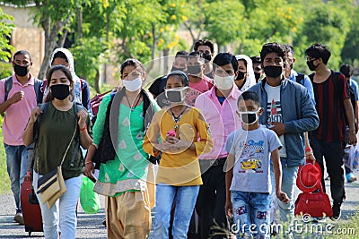 Migrant people returning to their home due to corona pandemic Editorial Stock Photo