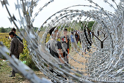 Migrants from Middle East waiting at hungarian border Editorial Stock Photo