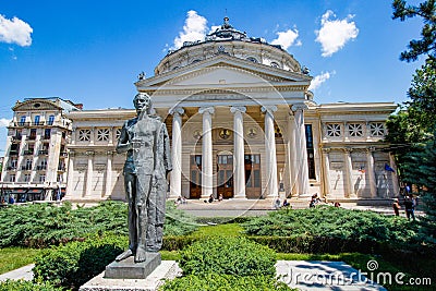 Mihai Eminescu statue in front of Romanian Athenaeum Editorial Stock Photo